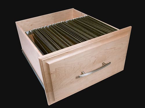 A filing drawer holding many folders