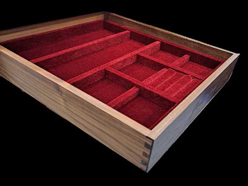 A velvet lined dovetail drawer for jewelry