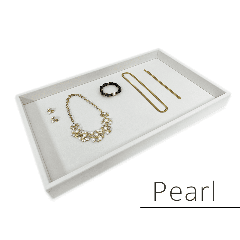 A soft pearl-colored velvet drawer for jewelry